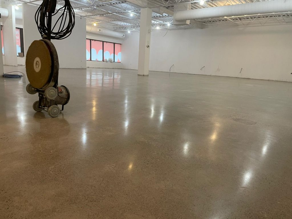 Image depicts a concrete polished floor as part of our concrete polishing for retail store in Oshawa project.