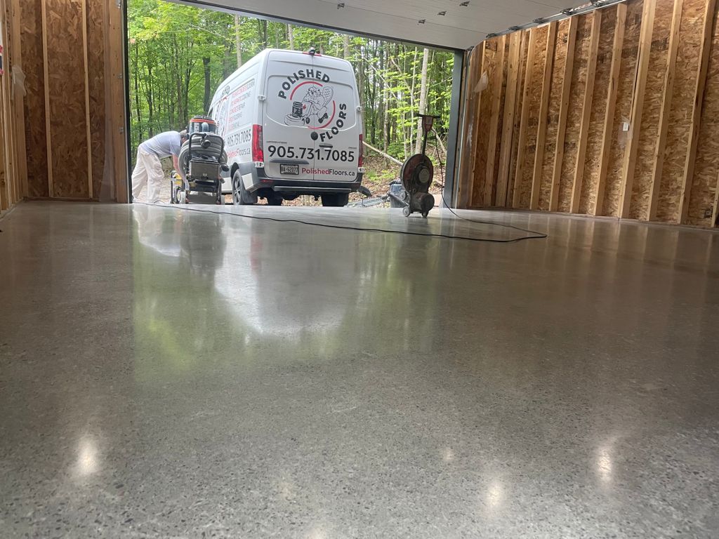 Image depicts a garage in the GTA with polished concrete.