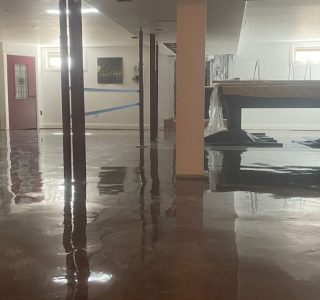Image depicts a basement floor in a Milton home from our basement clear epoxy Milton project