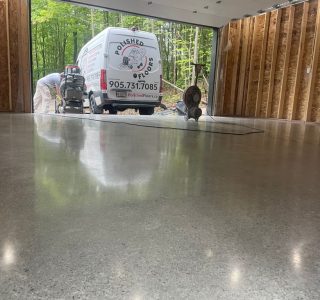 Image depicts a garage in the GTA with polished concrete.